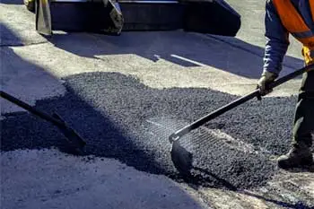 Asphalt patchwork driveway repair services in Anne Arundel County, MD.